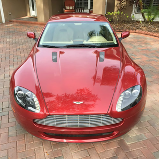 Illustration for article titled Get Your Bank Accounts Ready, The Aston Martin Vantage Just Got Stupid Cheap